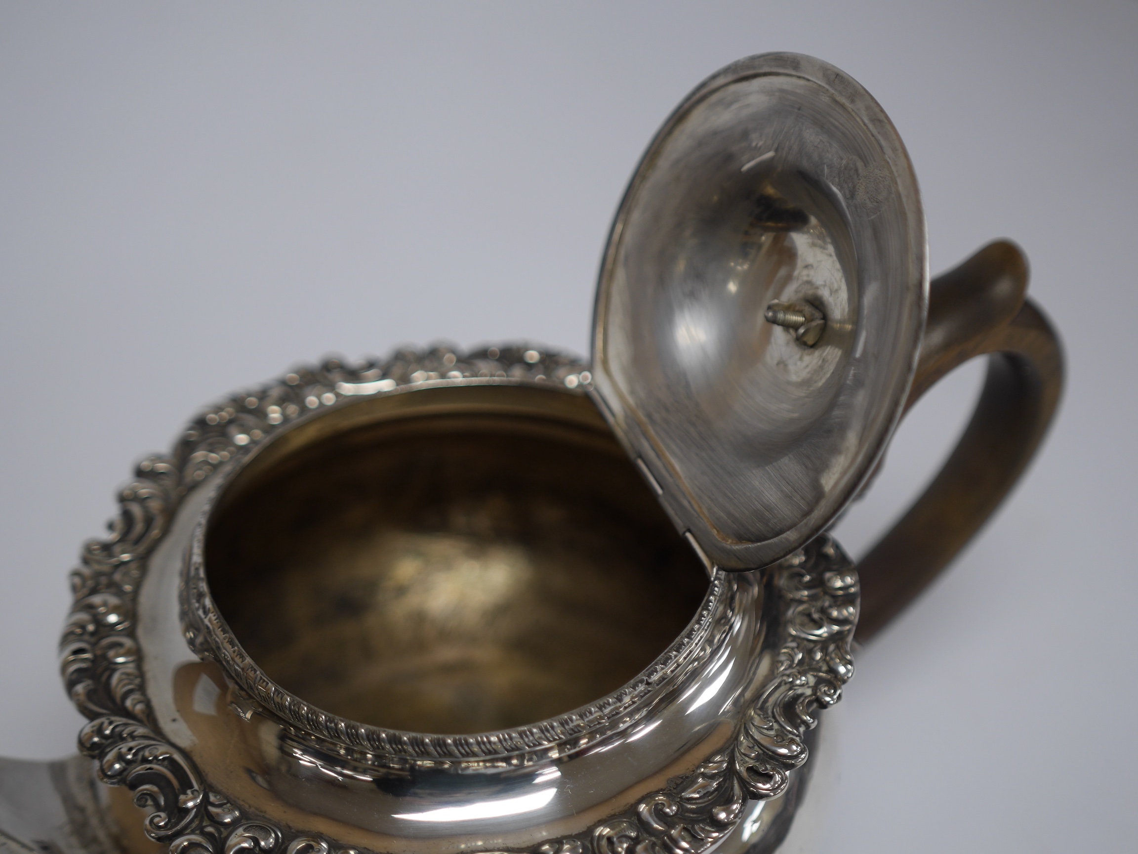 An early 19th century silver circular teapot, marks rubbed, by Thomas Blagden & Co, Sheffield, circa 1820, gross weight 22oz. Condition - poor